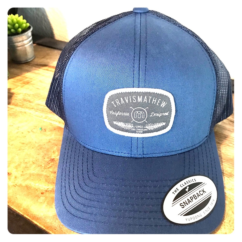 Travis Matthew trucker style hat.
